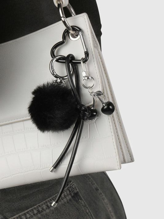 Praelia | Black Pom-Pom Heart Charm – Chic, Modern & Playful