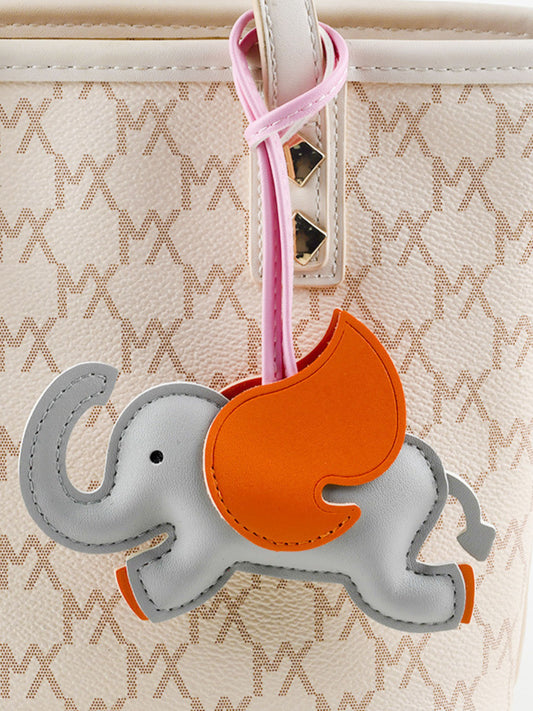 Luthien | Flying Elephant Leather Bag Charm – Whimsical Elegance & Playful Luxury