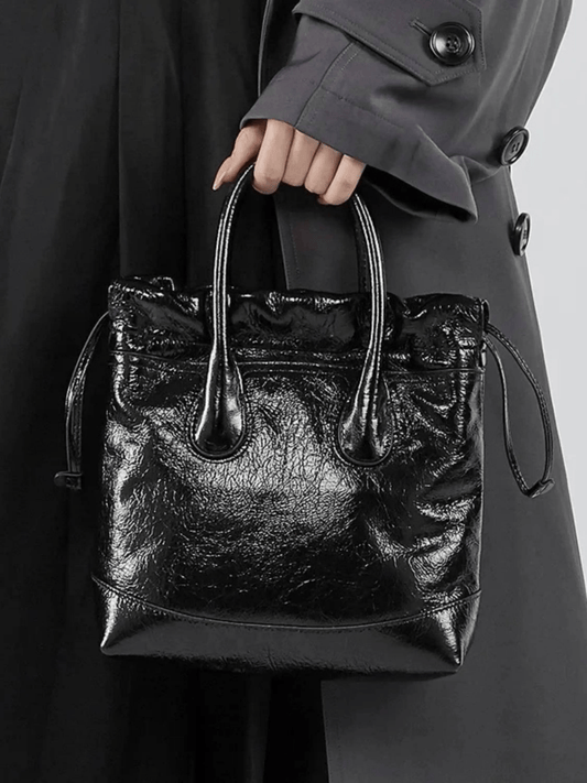 Maelora | Glossy Black Leather Drawstring Bag – Chic & Modern