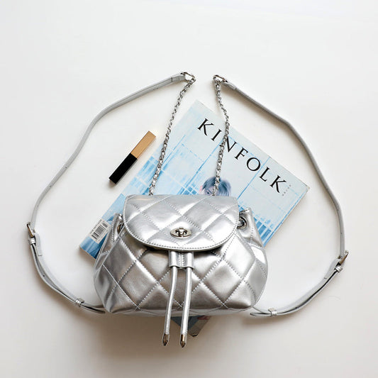 Perseis | Silver Quilted Leather Backpack – Chic, Trendy & Eye-Catching