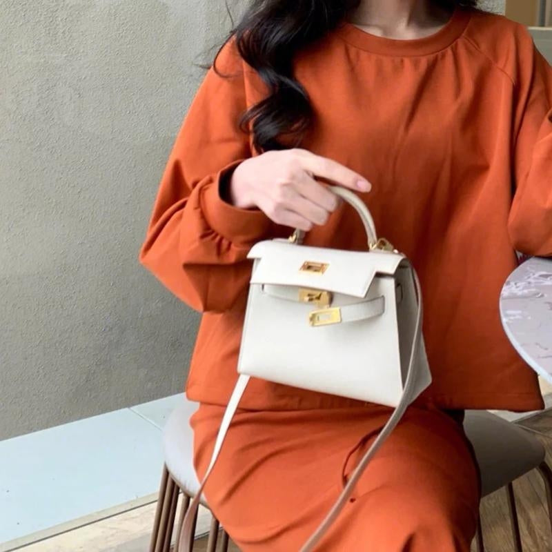 Galatea | Elegant Black Leather Handbag – Classic Luxury & Functionality