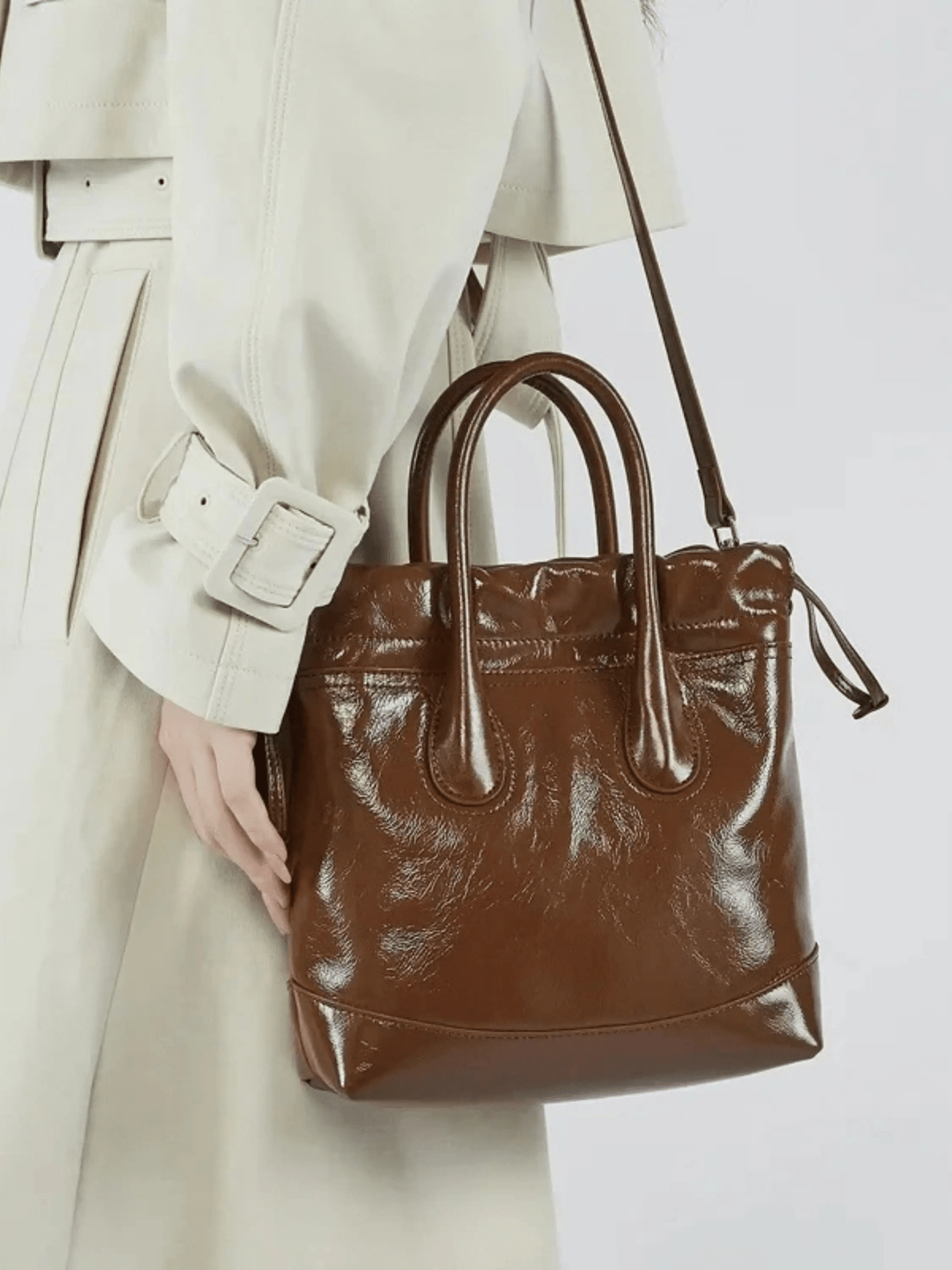 Maelora | Glossy Black Leather Drawstring Bag – Chic & Modern