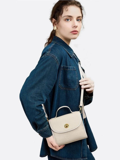 Aurora Signature Trapeze Bag – Structured Handbag with Turn-Lock Closure